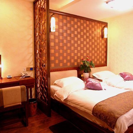 Lijiang Shishan Zhuyuan Hotel Esterno foto