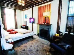 Lijiang Shishan Zhuyuan Hotel Esterno foto
