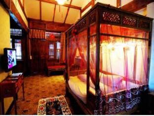 Lijiang Shishan Zhuyuan Hotel Esterno foto